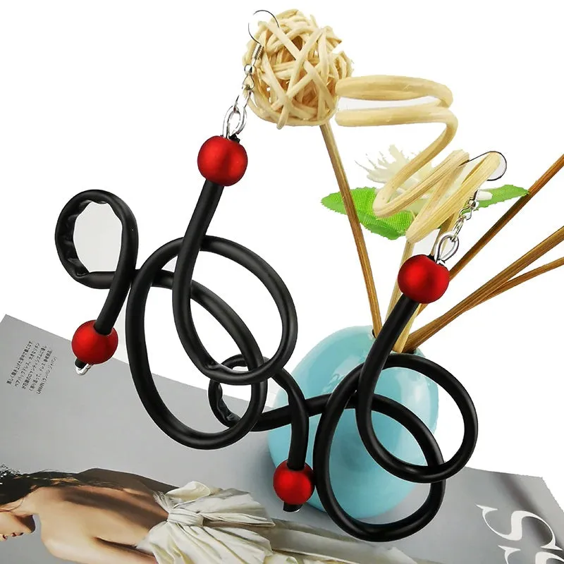 Recycled Rubber/Silicone Swirl Earrings with Faux Red Pearl Accents Dangle Earrings